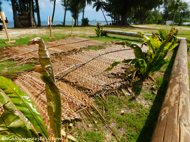 Woven coconut leaves make up the roof of the canoe house. | Saipan