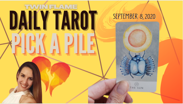 Tarot card sits next to a picture of a smiling, brown-haired lady. The words "Twin Flame Daily Tarot Pick A Pile" and September 8, 2020 are written across the picture.